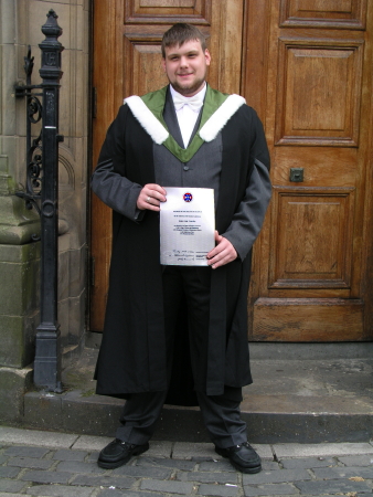 Robert with degree certificate
